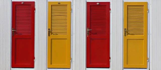 Four alternating red and yellow doors with slats