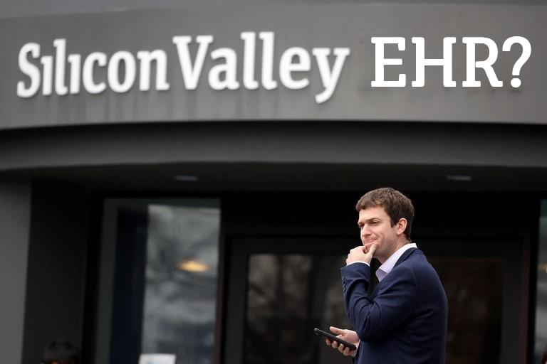 Man holding a phone with a questioning look on his face, standing beneath a sign that says "Silicon Valley EHR?"