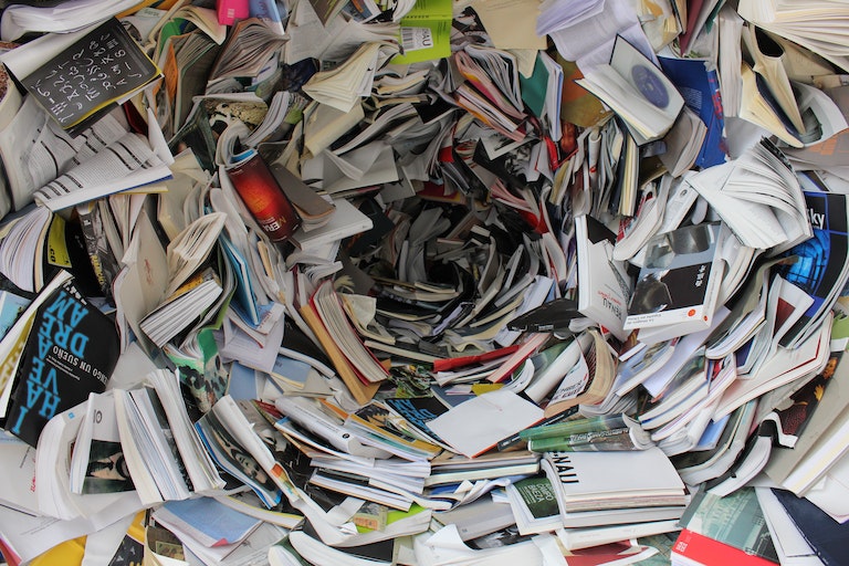 A pile of books swirling like a whirlpool